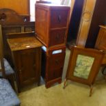 An oak bedside table, a pair of pedestal chests and a firescreen