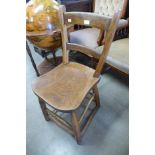 A Victorian elm and beech kitchen chair
