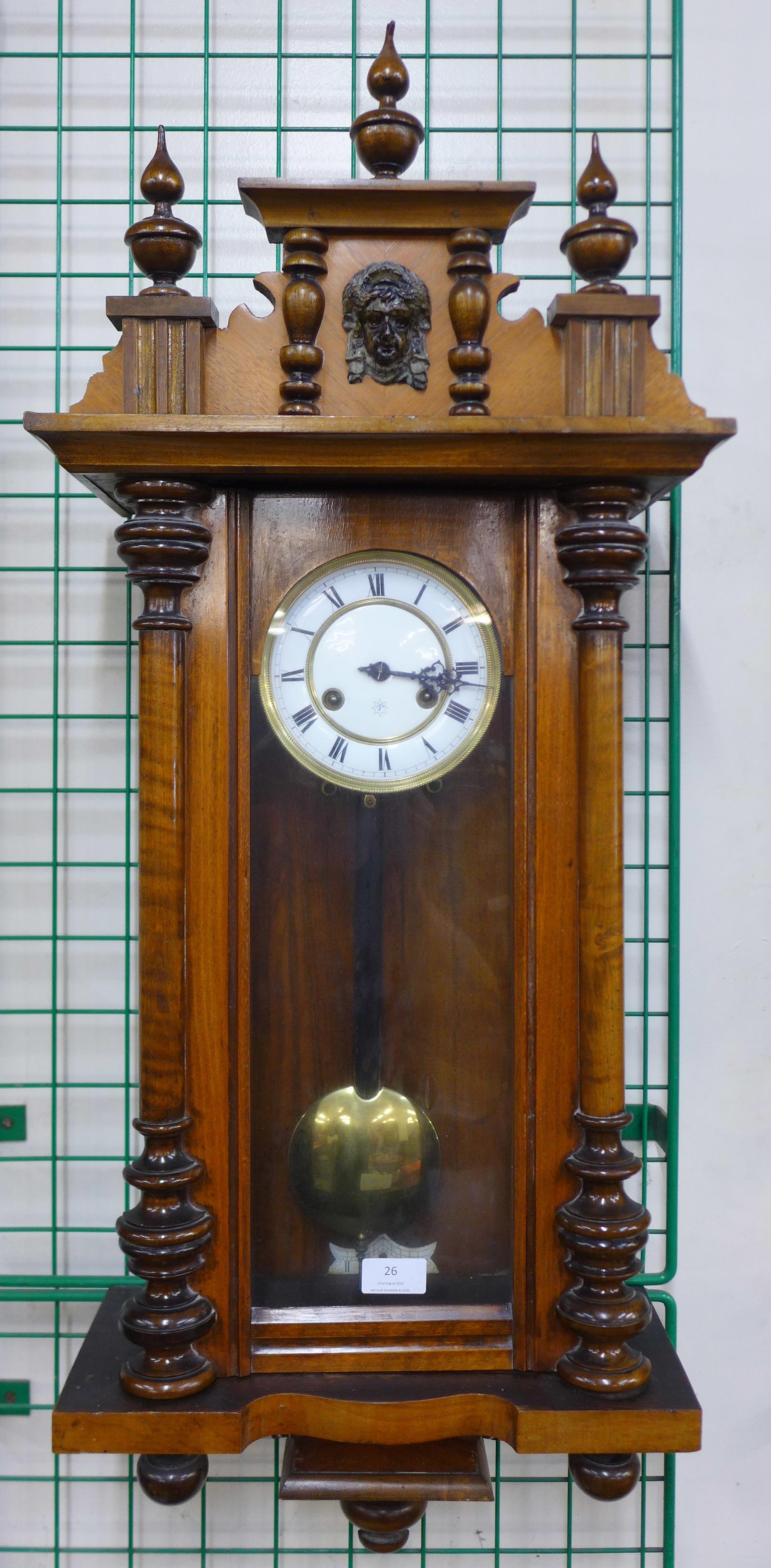 A 19th Century German Junghans walnut Vienna wall clock