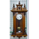 A 19th Century German Junghans walnut Vienna wall clock