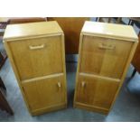 A pair of G-Plan light oak bedside cabinets