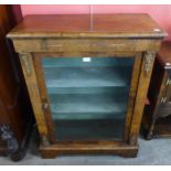 A Victorian inlaid walnut and gilt metal mounted pier cabinet