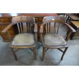 A pair of Victorian oak desk chairs