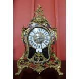A Boulle style faux tortoiseshell and gilt metal clock, 56cms h