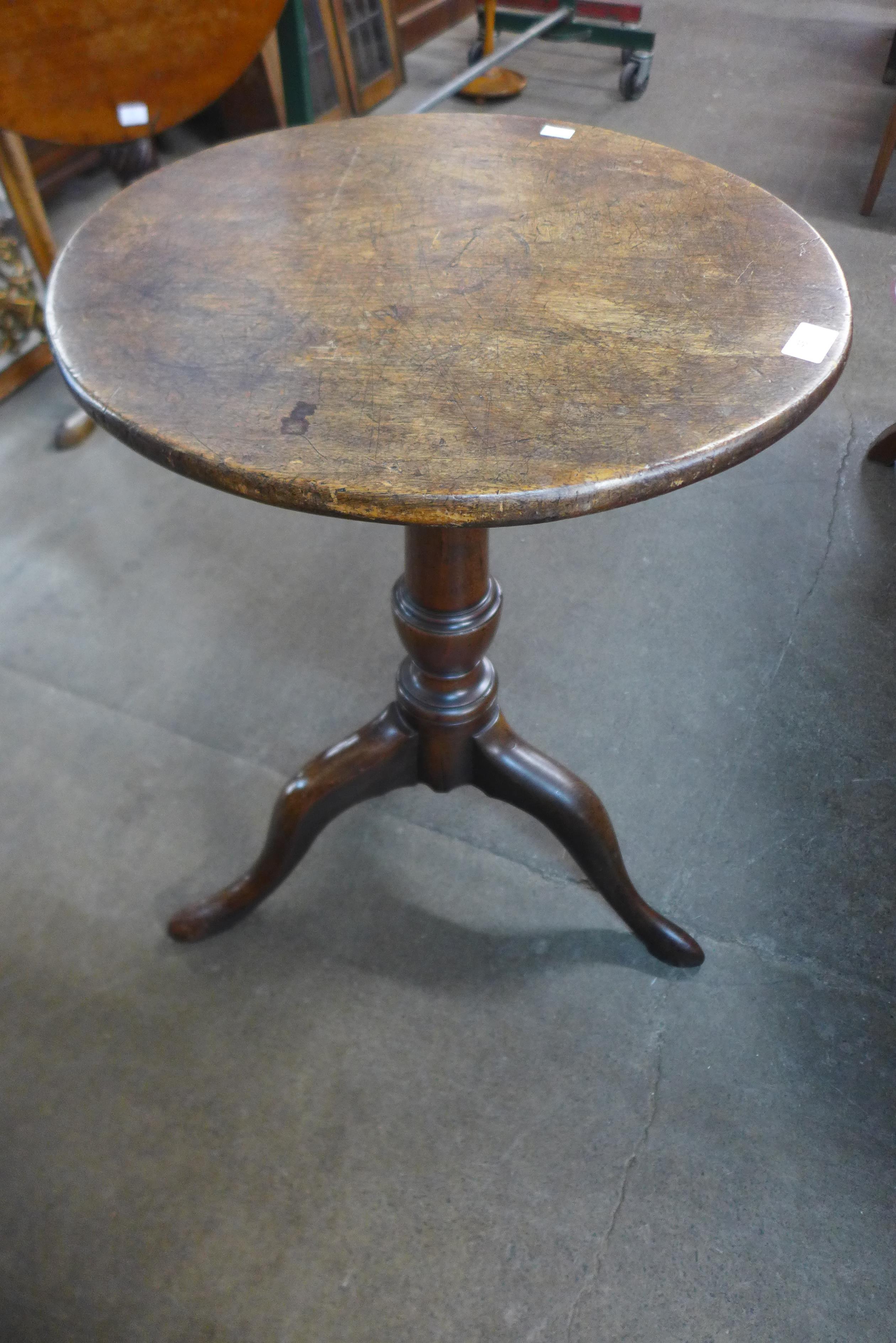 A George III mahogany circular tripod table