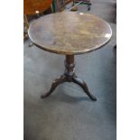 A George III mahogany circular tripod table
