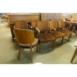 A set of eight Art Deco walnut dining chairs