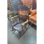 An early 20th Century American beech rocking chair