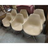 A set of six chrome based chairs