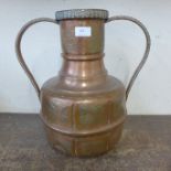 An eastern hammered copper ewer