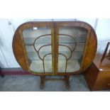 An Art Deco walnut display cabinet