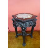 A Chinese marble topped padouk jardiniere stand, 58cms h