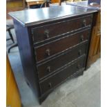 An oak chest of drawers