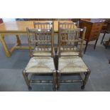 A set of four elm and beech spindle back chairs