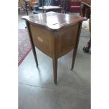 An Edward VII inlaid mahogany sewing table