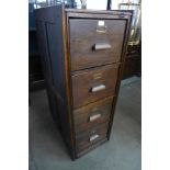 An early 20th Century oak filing cabinet