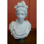 A white marble bust of a 19th Century lady, on black marble socle, 61cms h