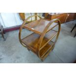 An Art Deco walnut trolley