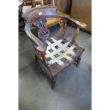 A Victorian elm and yew desk chair