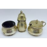 A three piece silver cruet set by Goldsmiths & Silversmiths, a/f, 98g