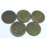 A George III 1806 penny and four 1797 cartwheel pennies