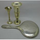 Two silver vases and a silver backed hand mirror, tallest vase 16.5cm