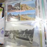 An album of approximately 150 postcards including English and worldwide, mid 20th Century onwards