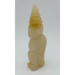 A carved hardstone figure of a court attendant, 9cm