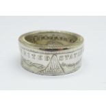 A large ring made from an American 1883 silver one dollar coin, 22.4g