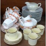 Twelve Chinese plates, a Staffordshire Azalea six setting tea set and five coffee cans and saucers