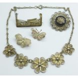 Four filigree brooches and a necklace