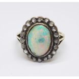 An 18ct gold, opal and old cut diamond ring, opal a/f, 6.7g, R