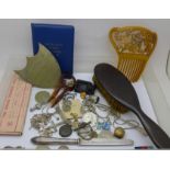 Coins, silver and other jewellery, ebony hair brush, hair comb, etc.
