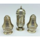 A Victorian silver pepper, Chester 1900, and a small hallmarked silver salt and pepper pair, 45g