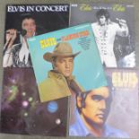 Four Elvis Presley LP records and one other classical record