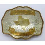 A large Gary's Belt Buckle, marked German Silver, depicting Texas and marked Fluor