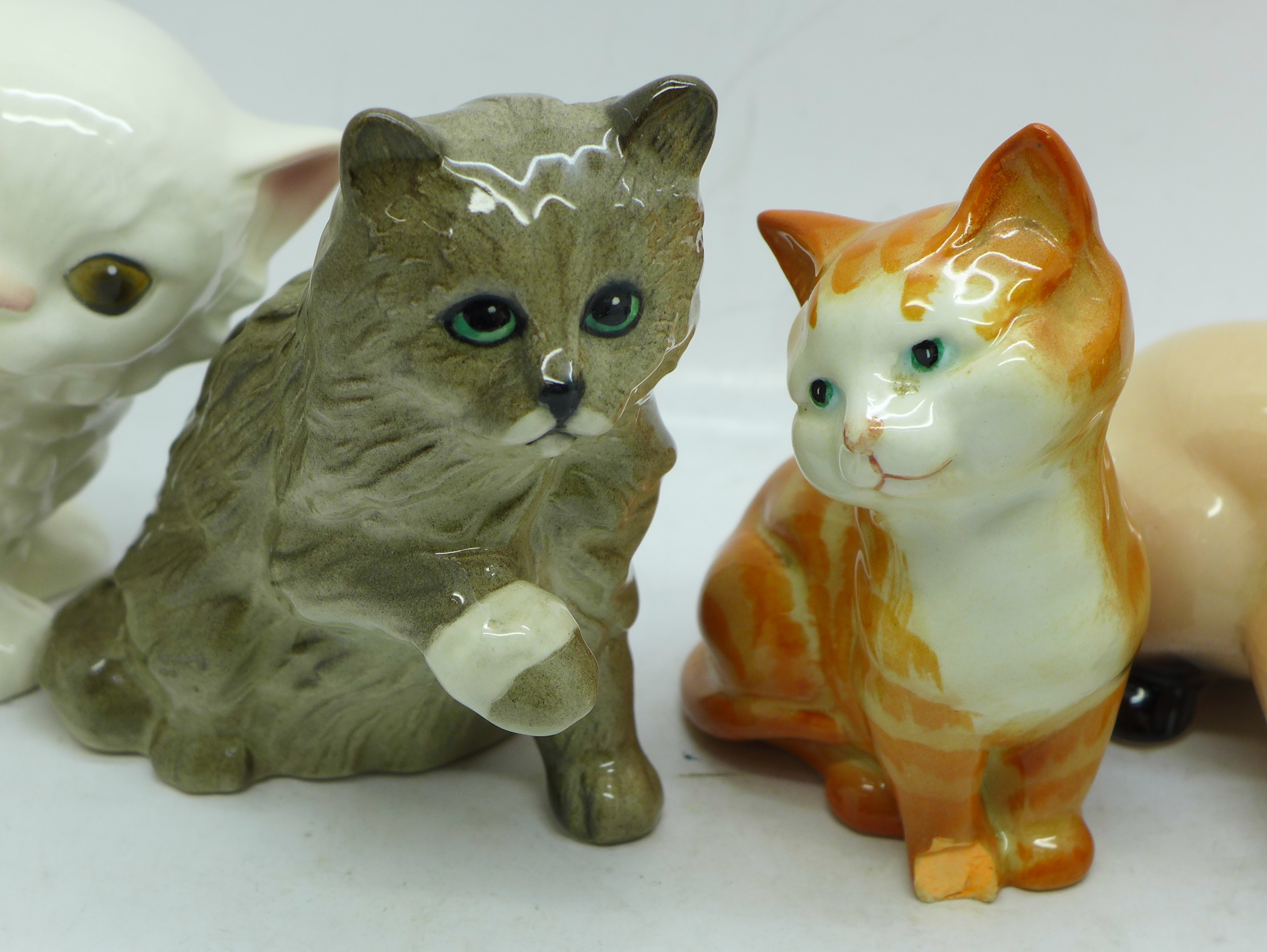 Seven cat figures, three Royal Doulton, two Beswick, one a/f, and two Goebel - Image 4 of 4