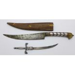 A dagger with scabbard and a souvenir letter opener marked Carcassonne