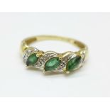 A 9ct gold, diamond and emerald ring, 1.9g, O