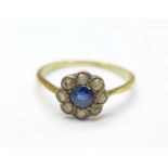 A 15ct gold, blue and white stone cluster ring, 1.4g, M, in a vintage green Bakelite box