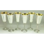 Six silver goblets with gilt interior, boxed, 760g