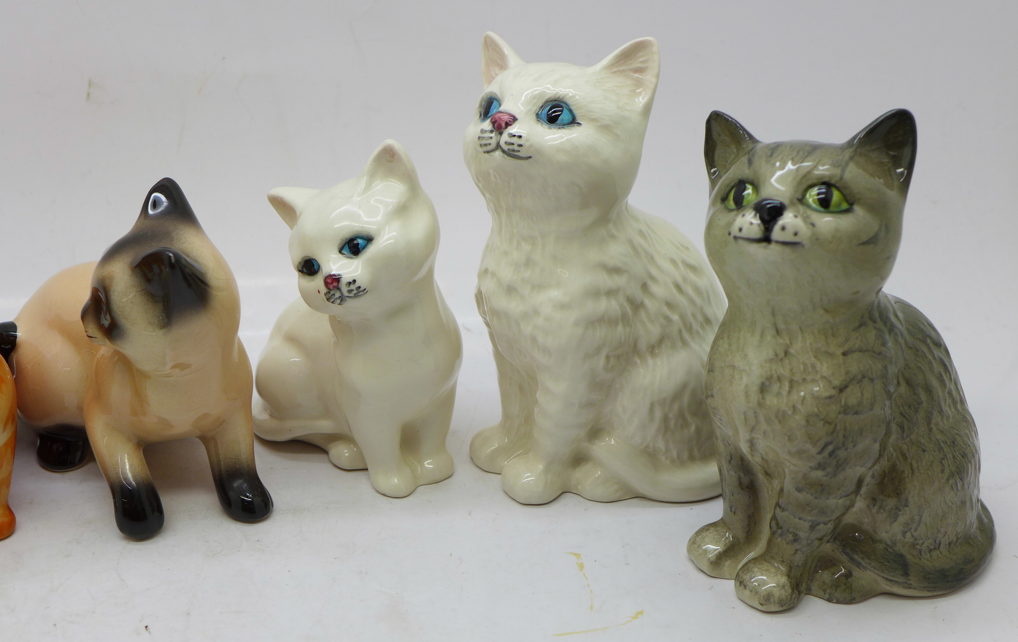 Seven cat figures, three Royal Doulton, two Beswick, one a/f, and two Goebel - Image 3 of 4