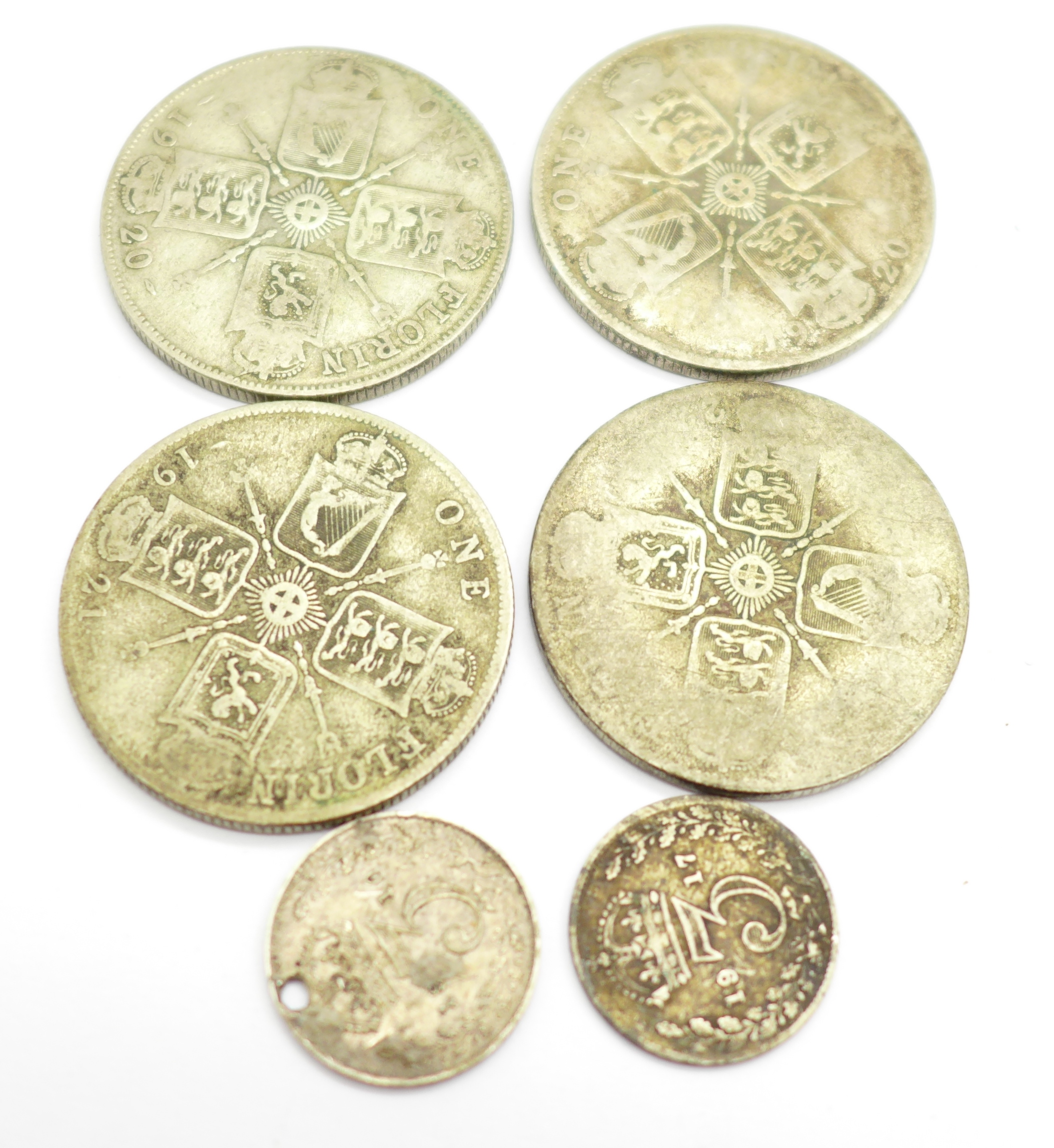 Four 1920's one florin coins and two 3d coins, one a/f