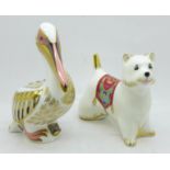 Two Royal Crown Derby paperweights, West Highland Terrier with silver stopper and White Pelican with