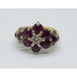 An 18ct gold, diamond and ruby cluster ring, 6.5g, I