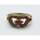 A 9ct gold and ruby 'love hearts' ring, 2.5g, M