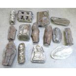 A collection of novelty hinged chocolate moulds, some marked H. Walter, Berlin and Anton Beiche,