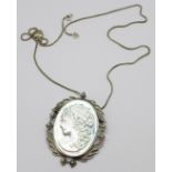 A silver and mother of pearl cameo brooch/pendant on chain