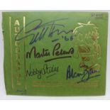 A World Cup Willie Autographs book front cover signed by Geoff Hurst, Martin Peters, Nobby Stiles