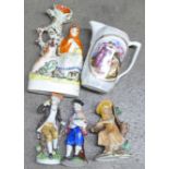 A Staffordshire figure, three European figures and an opalescent jug **PLEASE NOTE THIS LOT IS NOT
